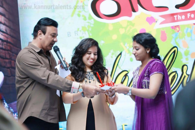 Receiving award from Music Director Anu Malik